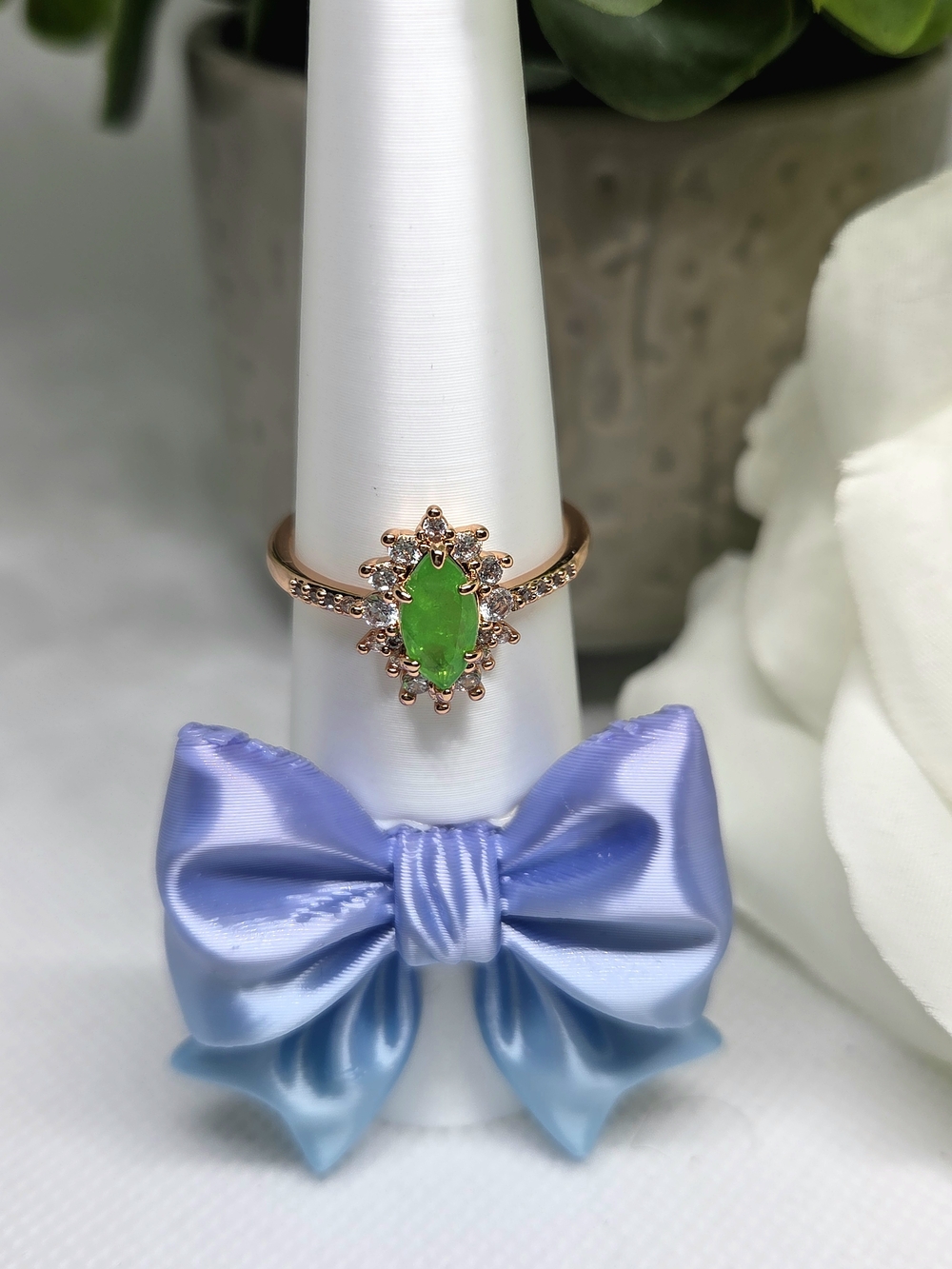 BP Ring with Green Marquise Center and Clear Accent Stones On Rose Gold Plating